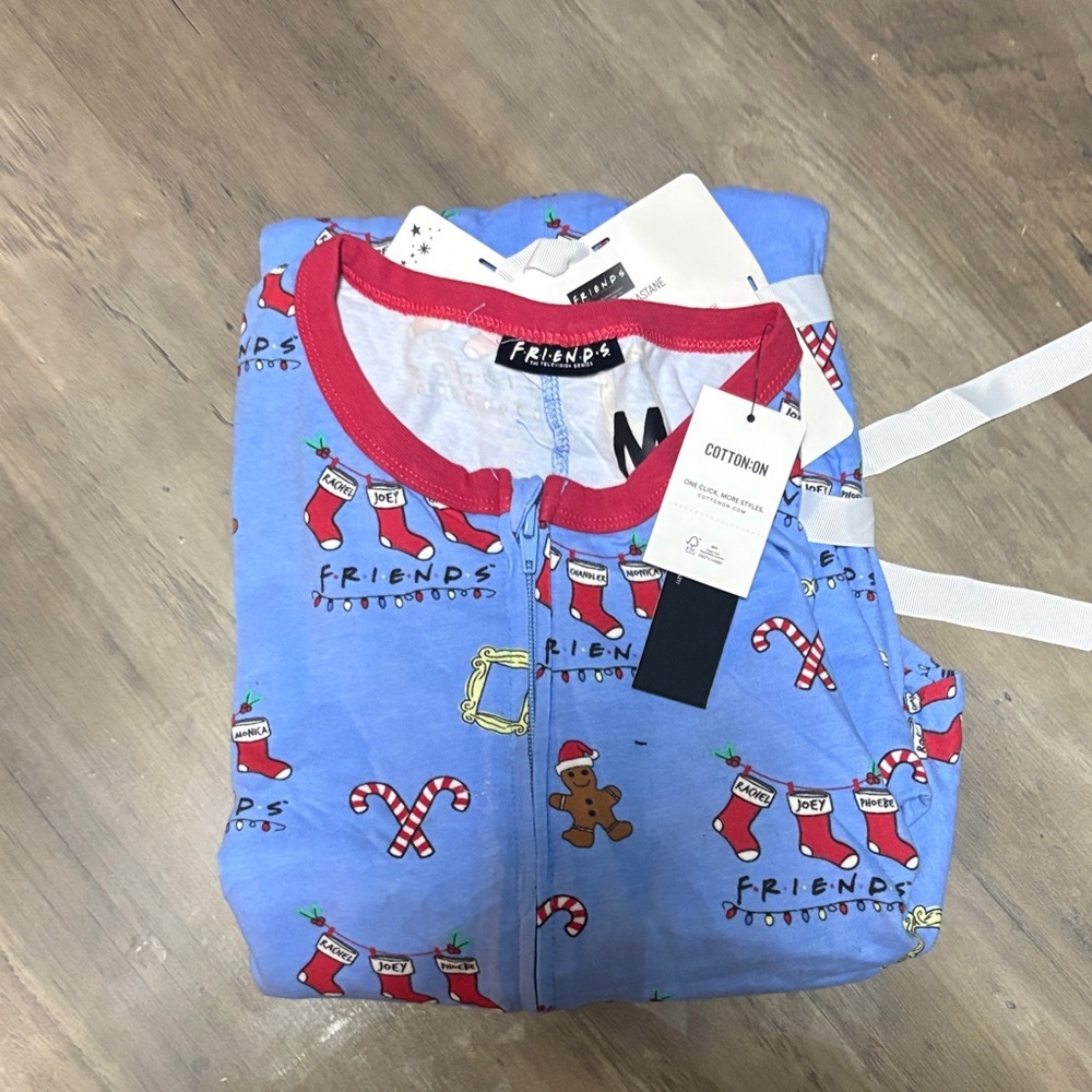 Cotton On Woman’s  Blue Holiday Onesie Pajama Set with Red Trim